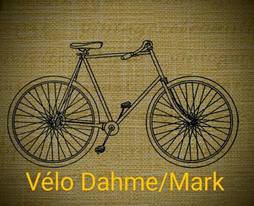 a drawing of a bike on a wall at Velo Dahme - Appartement in historic building in Dahme
