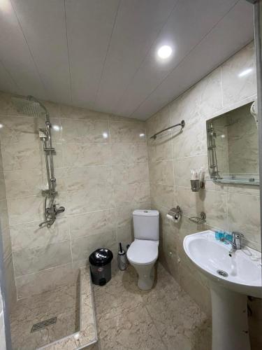 Koupelna v ubytování Hotel Shina