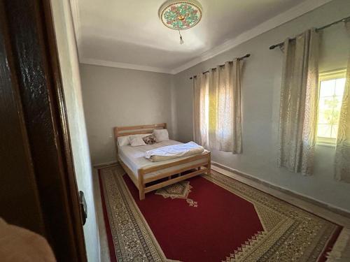 Voodi või voodid majutusasutuse Appart'Hotel ROSANO toas