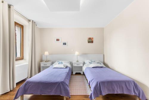 Ένα ή περισσότερα κρεβάτια σε δωμάτιο στο Villa San Vincenti