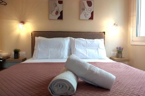 Ένα ή περισσότερα κρεβάτια σε δωμάτιο στο Elena Roza Apartment