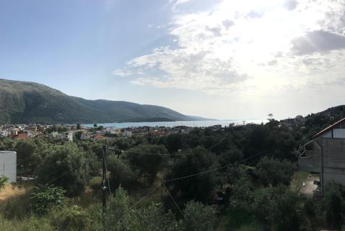 a view of a city and a body of water at Bafas Apartments in Plataria