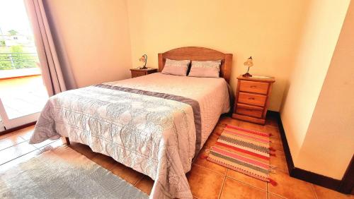 Postel nebo postele na pokoji v ubytování Casa Gouveia