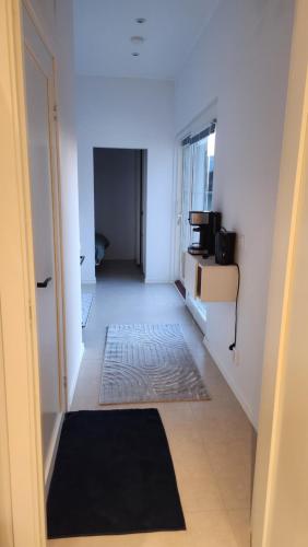 a hallway with a door leading into a room at Villa Kartal in Lund