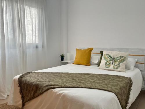 Postel nebo postele na pokoji v ubytování Tajues Apartment
