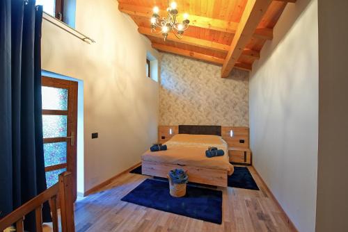 Postel nebo postele na pokoji v ubytování Residenza ai Mulini