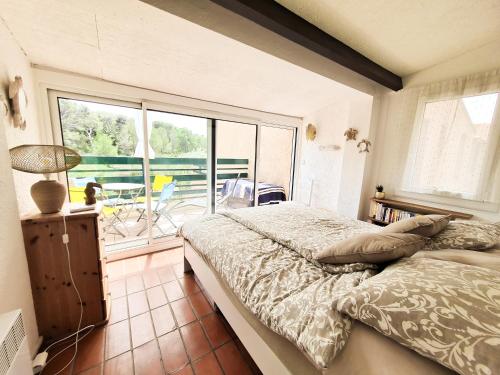 Llit o llits en una habitació de L'occitane