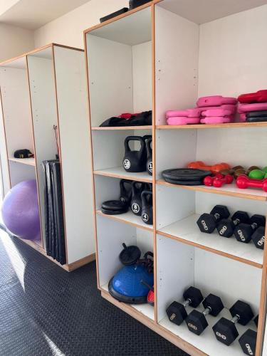 a room with white shelves filled with at Patagonia II in Puerto Madryn