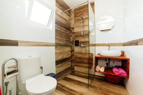 a bathroom with a toilet and a shower at Apartments Mar in Ulcinj