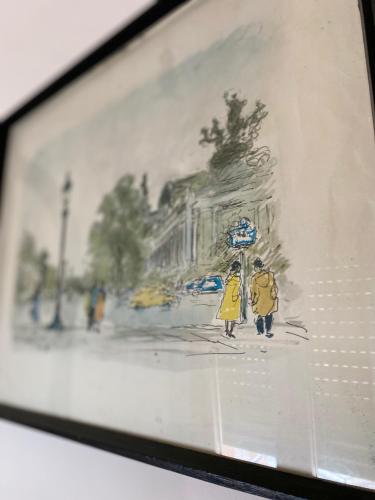 a drawing of a woman in a yellow coat walking down a street at B&B Casa Benvenuto in Diamante