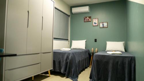 Postel nebo postele na pokoji v ubytování Jahu Center Casas