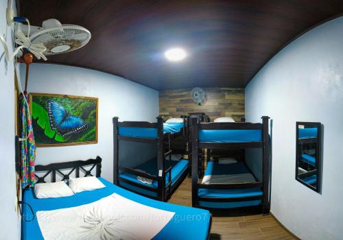 Postel nebo postele na pokoji v ubytování Hostel Tortuguero 7BackPackers