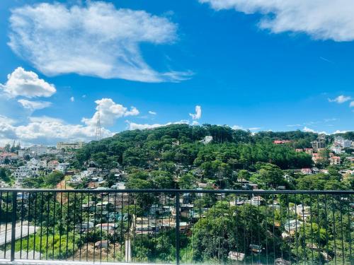 a view of the city from the balcony of a building at Memory Inn - Valley View in Xuan An