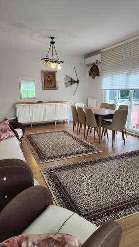 a dining room with a table and chairs at Arya home 18 in Trabzon