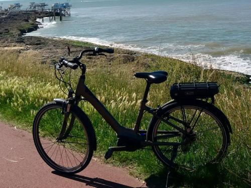 Appartement à 1km des plages avec 2 vélos élec