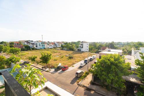a view of a street in a city with buildings at Hoianese Sunset Serenity Hotel in Hoi An