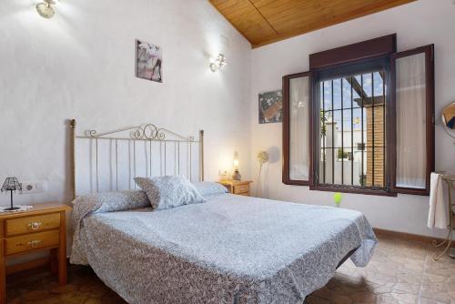 En eller flere senge i et værelse på Casa Nazaret