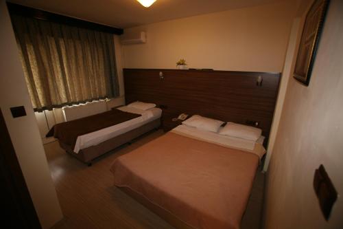 Imagen de la galería de Kutlugun Sahil Otel, en Akçay