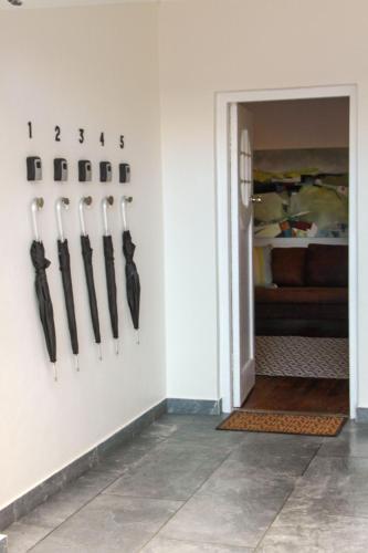 a room with axes hanging on a wall at Hermanus Champagne Accommodation in Hermanus