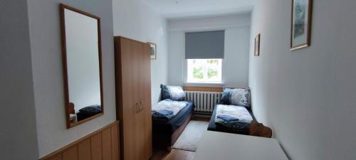 Postel nebo postele na pokoji v ubytování "Schullandheim Waltershausen" Hotel & Erlebniswelt