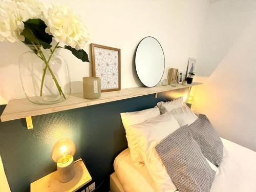 Katil atau katil-katil dalam bilik di Le Jardin - Calme et Confort - Lac de Nantua