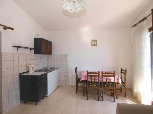 Kuchyň nebo kuchyňský kout v ubytování Apartmani Korljan
