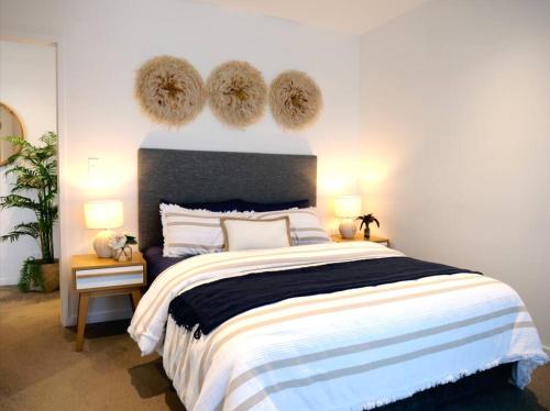 Ένα ή περισσότερα κρεβάτια σε δωμάτιο στο Broadbeach Stunner Modern and Central