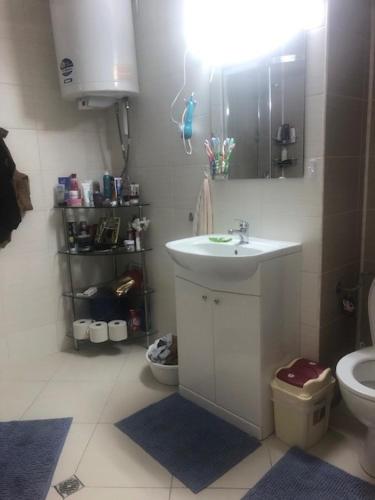 a bathroom with a sink and a toilet at Ravda Sun Sea Ressort 2 in Ravda