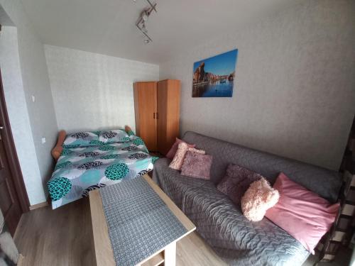 Posteľ alebo postele v izbe v ubytovaní Apartament na Podwalu