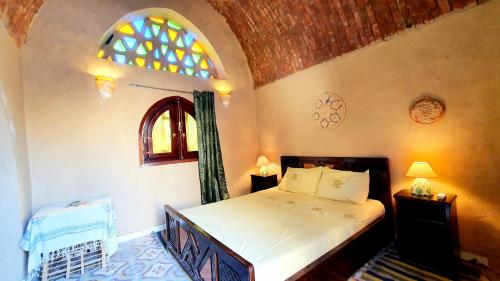 Postel nebo postele na pokoji v ubytování Scorpion House Luxor