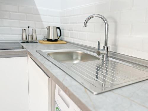 Küche/Küchenzeile in der Unterkunft Global Properties, Apartamento con gran terraza en la playa de Canet