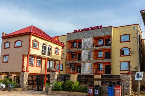 a group of buildings next to each other at NKA Properties in Apenkwa