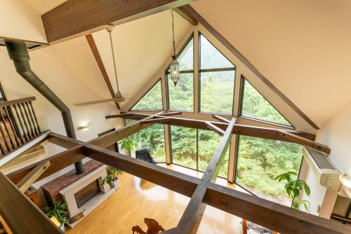 an overhead view of a loft with large windows at HAYATO HAKONE GUEST HOUSE in Hakone