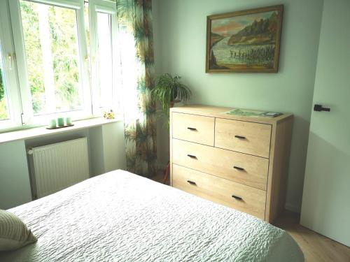 Katil atau katil-katil dalam bilik di Apartament Nałęczowski Zakątek