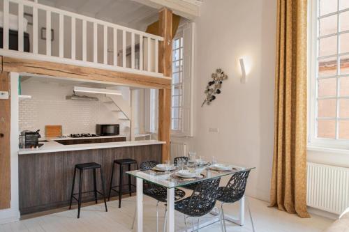 Kuchyň nebo kuchyňský kout v ubytování Appartement d'exception au pied de la cathédrale