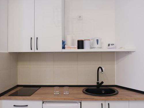 Küche/Küchenzeile in der Unterkunft Hexagon Apartment
