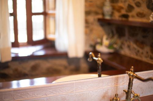 Ένα ή περισσότερα κρεβάτια σε δωμάτιο στο Hotel Mas 1670 - Adults Only