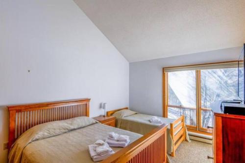 Postel nebo postele na pokoji v ubytování Lincoln Station Retreat