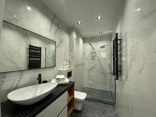 Ванная комната в Modern Apartment with Exceptional Location