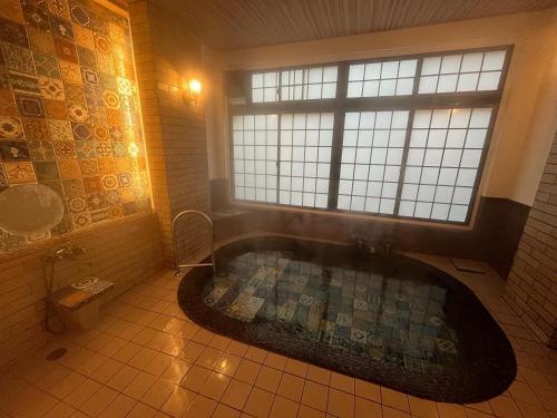 Koupelna v ubytování Historical Ryokan SENYUKAN