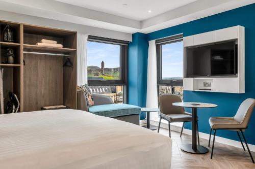 Voodi või voodid majutusasutuse Roomzzz Edinburgh toas
