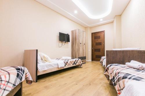 Postel nebo postele na pokoji v ubytování Sweet Home 11 VIP at Freedom Square