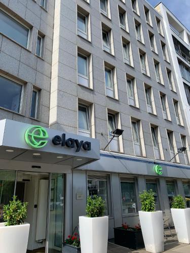 a close up of the front of a clova building at elaya hotel hannover city in Hannover