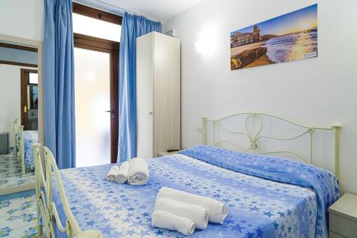 Posteľ alebo postele v izbe v ubytovaní Hotel La Marina