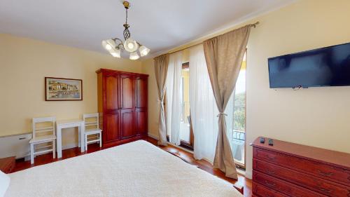 Postel nebo postele na pokoji v ubytování Villa Bambi