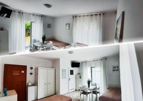 twee met uitzicht op een woonkamer en een woonkamer bij Villa Zosia in Rowy