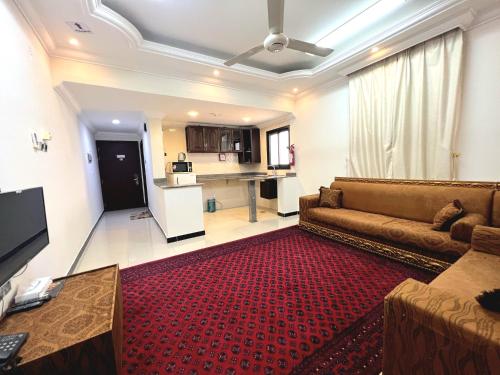 TV a/nebo společenská místnost v ubytování Al Taraf Hotel Apartment
