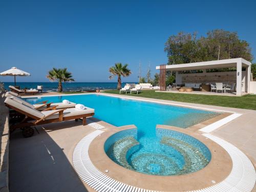 Hersonissos Beach Villa - Your Seafront Retreat by etouri
