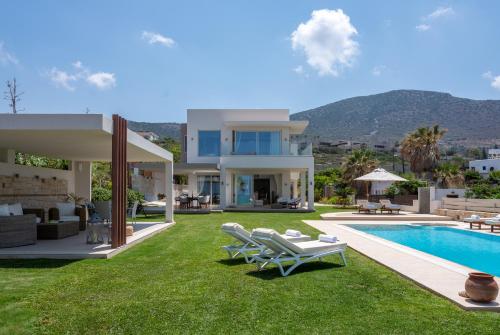 Hersonissos Beach Villa - Your Seafront Retreat by etouri