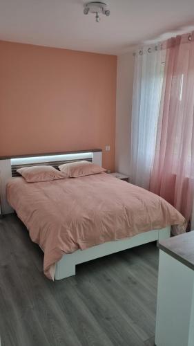 Postel nebo postele na pokoji v ubytování Gîte du vignoble